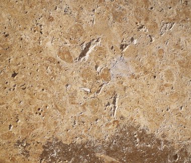 çukurlar ile sarı bir taş dokusuna