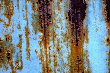                   Paslı metal doku, yüzeyde mavi boya kalıntısı               