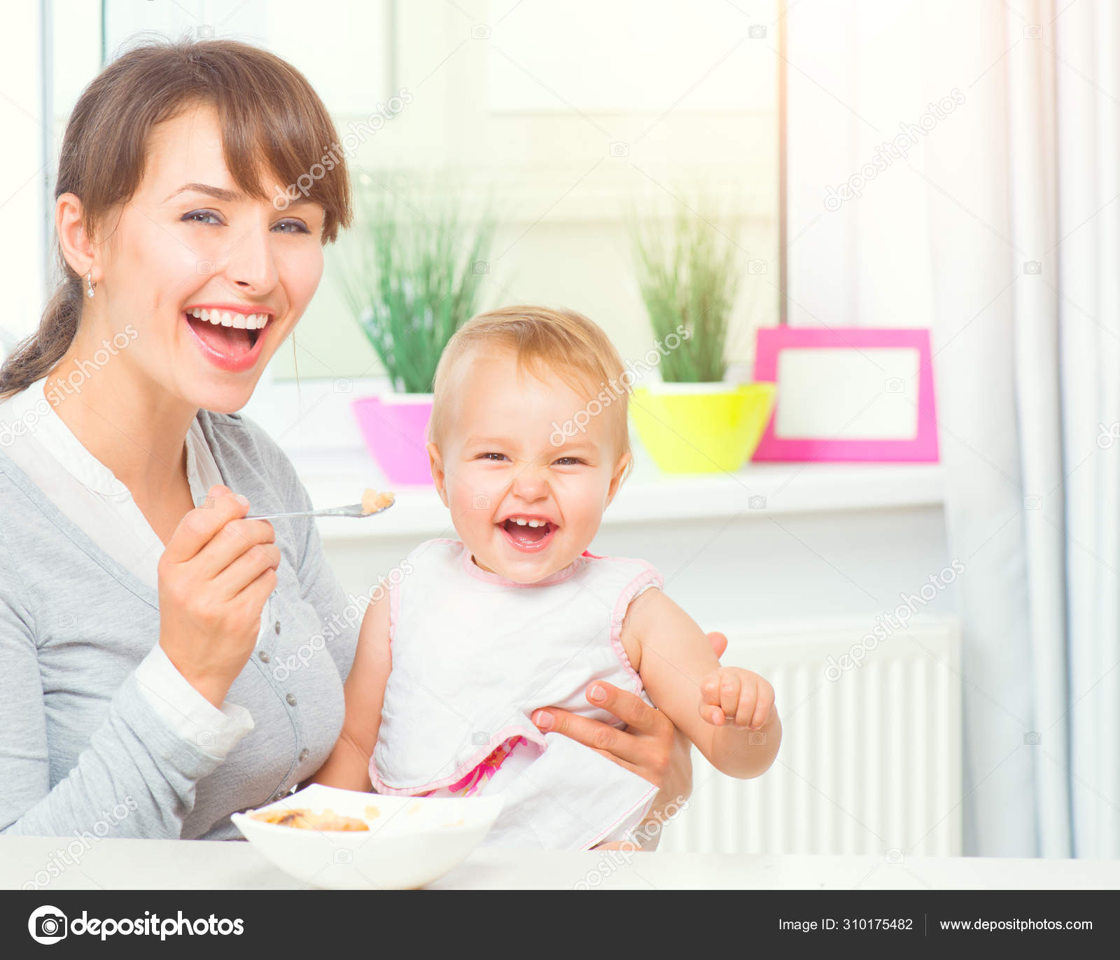 mother feeding her baby