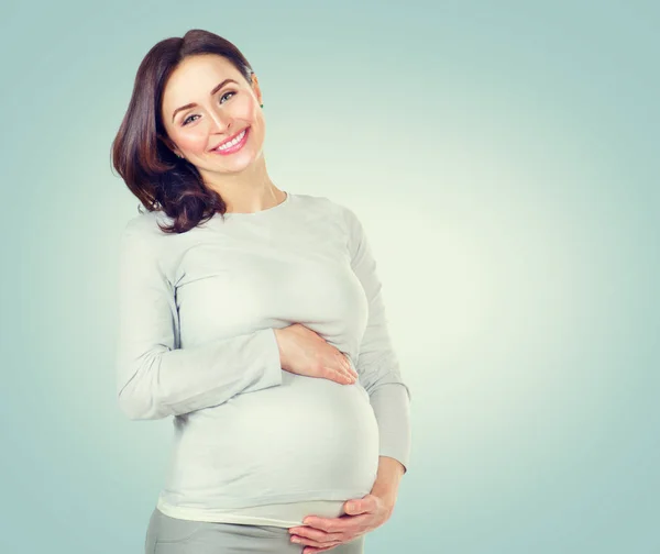 Mujer feliz embarazada tocándose el vientre. Embarazada de mediana edad wo —  Fotos de Stock