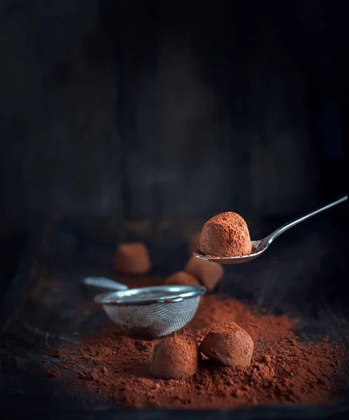 Chocolate truffles. Homemade fresh truffle chocolate candies with cocoa powder