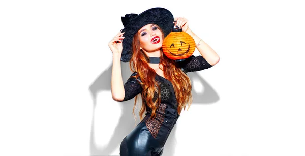 Halloween. Sexig häxa med ljusa semester makeup. Vacker Youn — Stockfoto