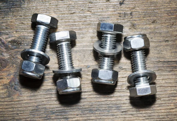 Bolts Nuts Isolated Wooden Background Top View — Stock Photo, Image