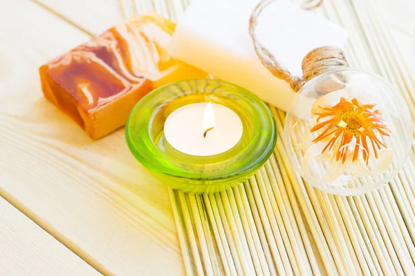 Spa Wellness Setting Yellow Flower Green Candle Oil Soap Wooden — Stock Photo, Image