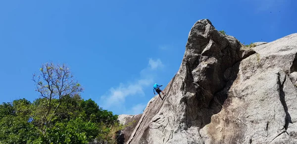 climbing the mountain in niteri, Brazil