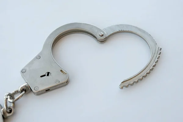 One Open Bracelet Police Handcuffs White Background Concept Law Violation — Stock Photo, Image