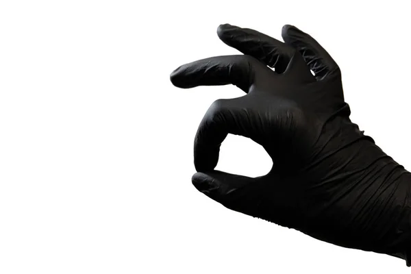 Die Rechte Hand Einem Schwarzen Handschuh Auf Weißem Hintergrund Ist — Stockfoto