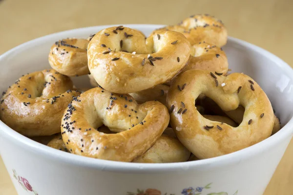 Baked Fresh Pretzels White Bowl Table Heart Twisted Knot Shapes — Stock Photo, Image