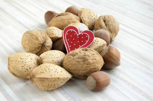Love Symbol Nuts Wooden Table Valentine Concept — Stock Photo, Image