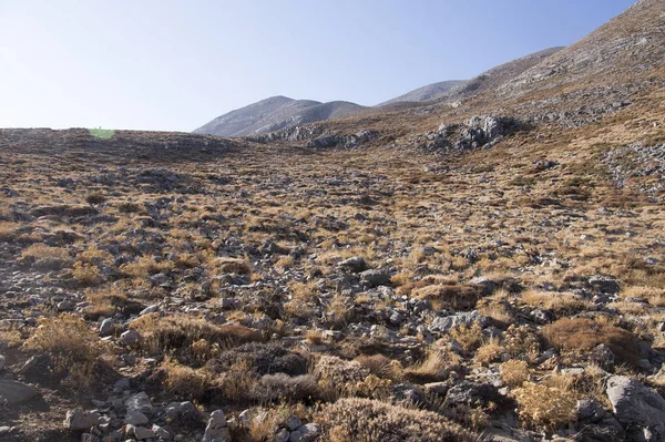 Greek Crete mountain range with highest mountain Ida Psiloritis, very dry hard terrain with sharp rocks and stones, natura park — Stock Photo, Image