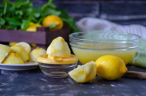 The process of making lemonade at home . Top view of lemonade ingredients