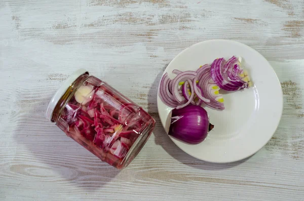 Chopped red onions  and pickled red onions isolated on white background