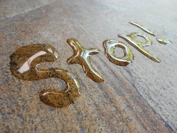 Stop spontaneous water handwriting calligraphy. Artistic and natural photo good use for any design you want.