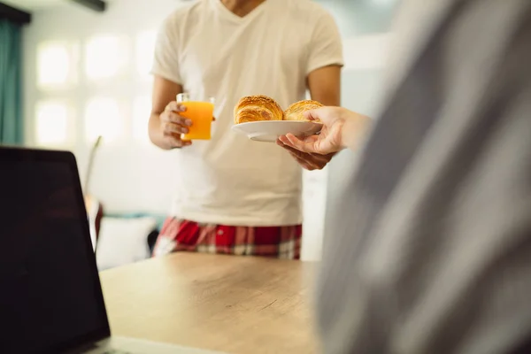 Cropped Shot Men Holding Croissants Orange Juice Prepared His Wife — Stock Photo, Image