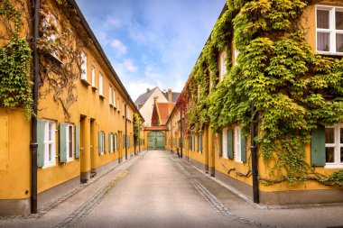 Augsburg: Fuggerei - the world oldest social housing. Bavaria, Germany clipart