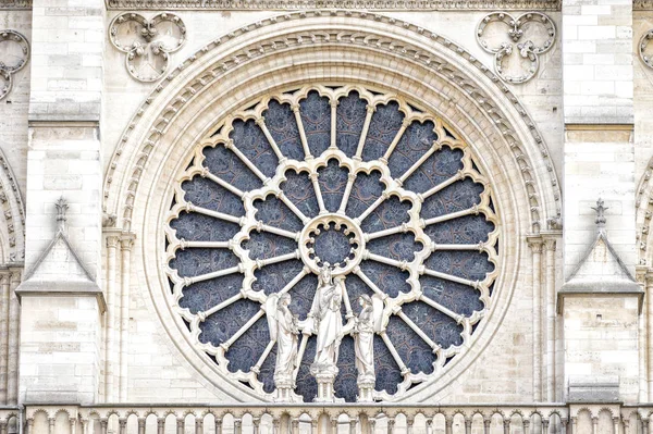 PARIS, NOTRE DAME: The western rose window, and architectural details of the catholic cathedral Notre-Dame de Paris. Built in French Gothic architecture, and it is among the largest and most famous churches