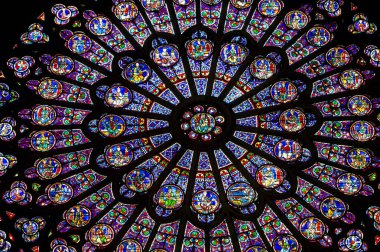 PARIS  FRANCE - JULY 17, 2018: The North Rose window at Notre Dame cathedral dates from 1250 and is also 12.9 meters in diameter. Its main theme is the Old Testament.