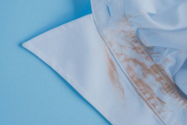cosmetic stain on collar shirt from daily life activity. dirt stains for cleaning and washing concept clipart