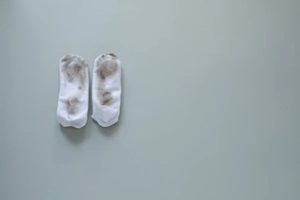 dirty socks isolated on gray background. High quality photo