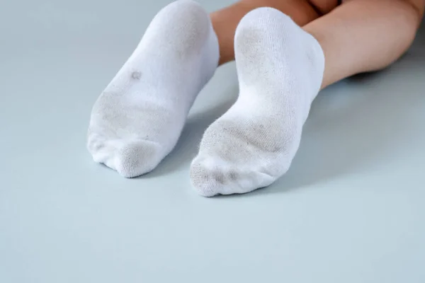 dirty socks isolated on gray background. High quality photo