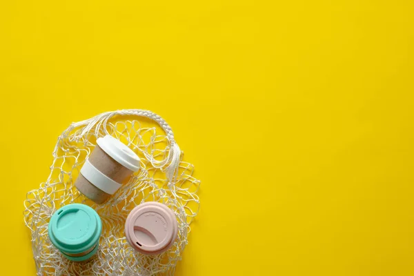 Reusable Coffee Mug Eco Bag Yellow Background Sustainable Lifestyle Plastic — Stock Photo, Image