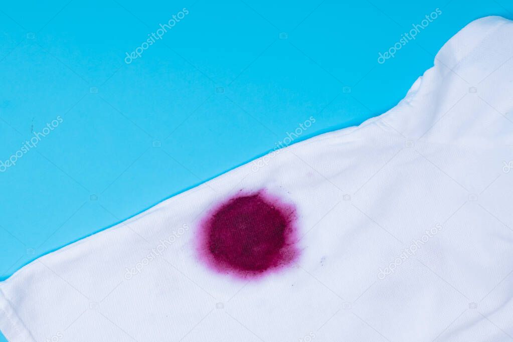 close up of a pink spot on clothes.daily life dirty stain for wash and clean concept. High quality photo