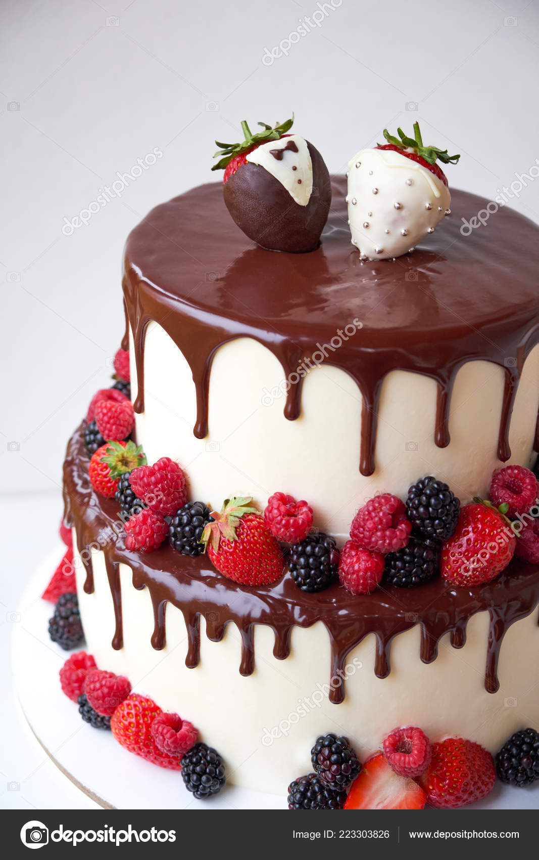 Two Tiered Wedding Cake Chocolate Slices Strawberries Raspberries
