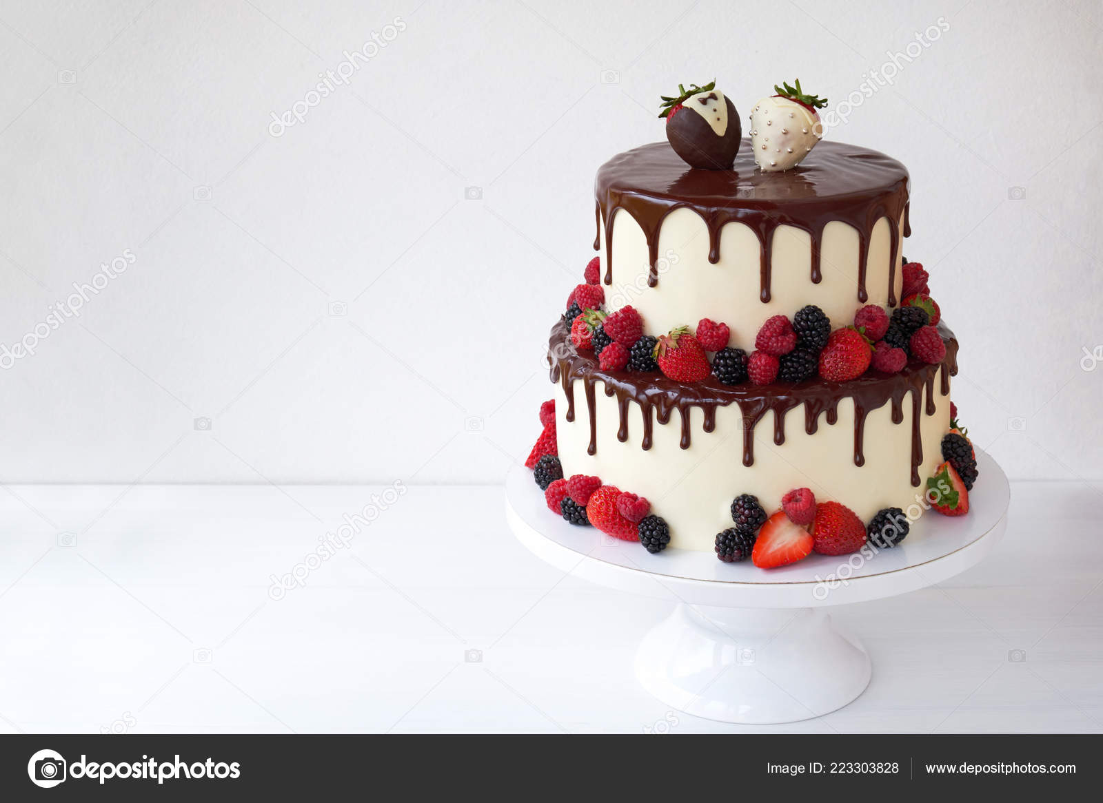Two Tiered Wedding Cake Chocolate Slices Strawberries Raspberries