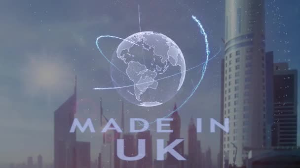 Made in UK text with 3d hologram of the planet Earth at the backdrop of the modern metropolis — стоковое видео