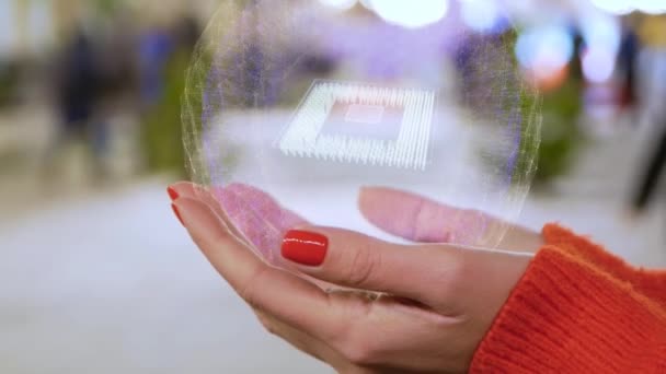 Vrouwelijke handen Holding hologram computer microchip — Stockvideo