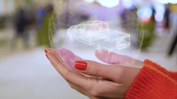 ホログラムピックアップトラックを保持する女性の手 — ストック動画