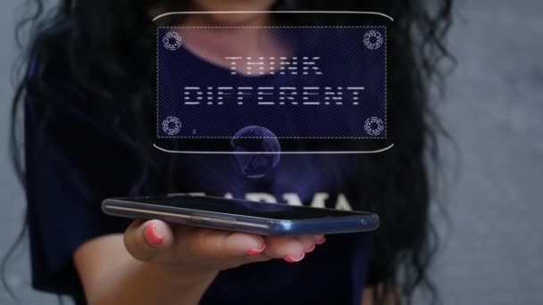 Woman showing HUD hologram Think different — Stock Video