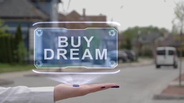 Mão feminina mostrando holograma Comprar sonho — Vídeo de Stock