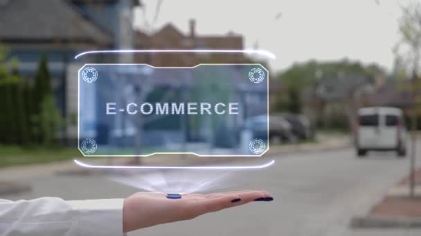 Weibliche Hand zeigt Hologramm E-Commerce — Stockvideo