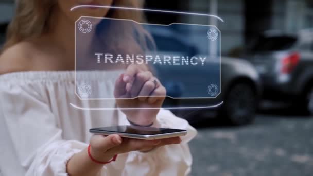 Rubia interactúa HUD holograma Transparencia — Vídeos de Stock