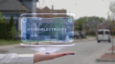 Kadın eli hologramı gösteriyor Hidroelektrik