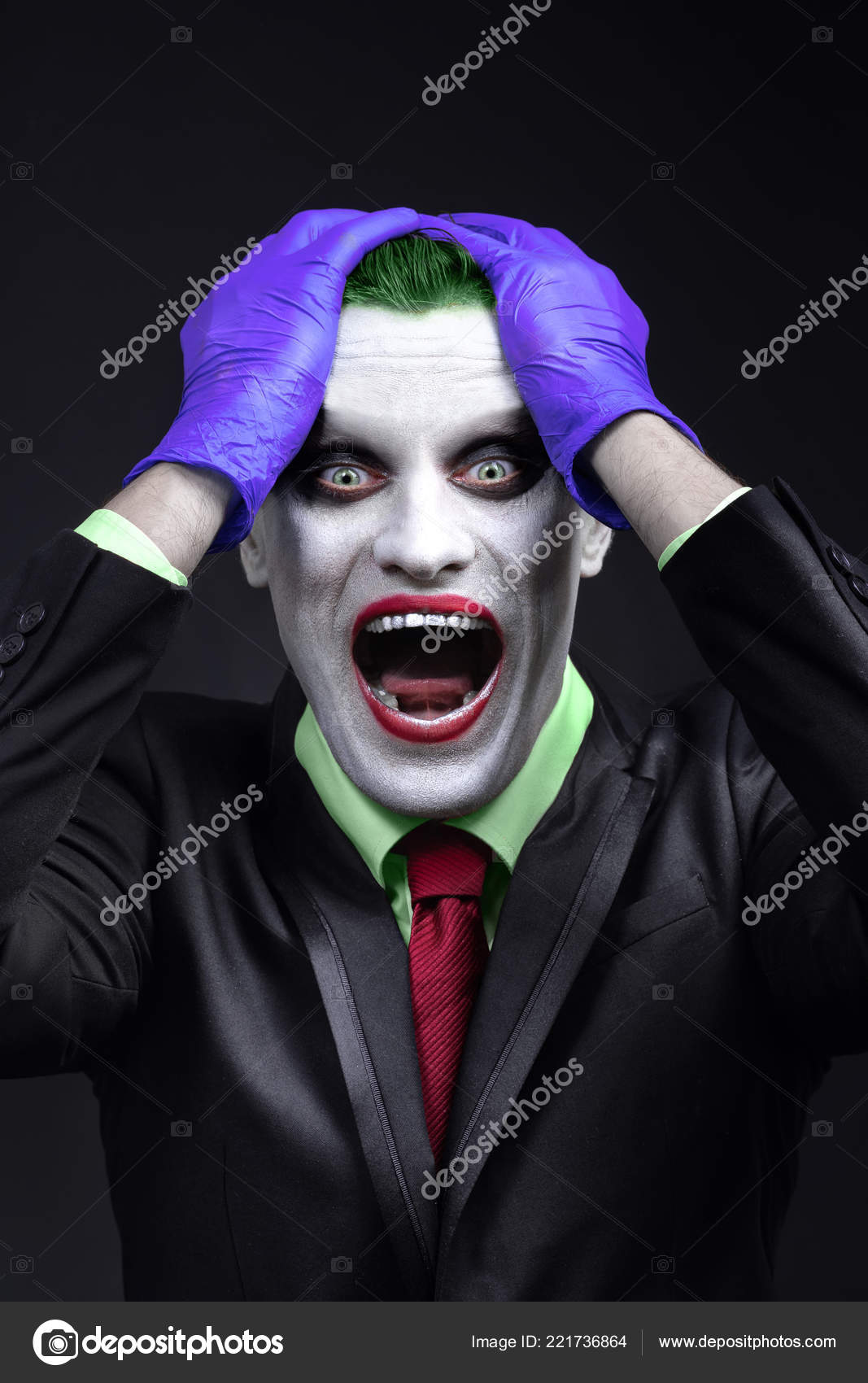 Portrait Of A Joker Makeup For Halloween Crazy Image Of A Man In A Green Shirt With Green Hair Stock Photo By C Shulgenko007