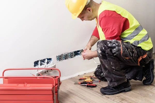 Repair of electrical installations, repair of electrical installations, electrician at work — Stock Photo, Image