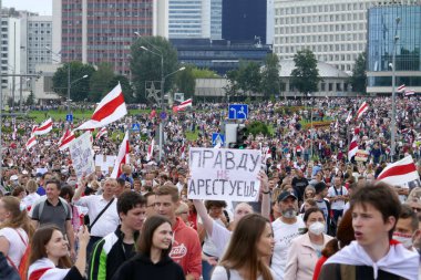 Protesters against the incumbent president of Belarus took to the streets of Minsk with placards and flags. Peaceful protest against dictator Lukashenko. clipart