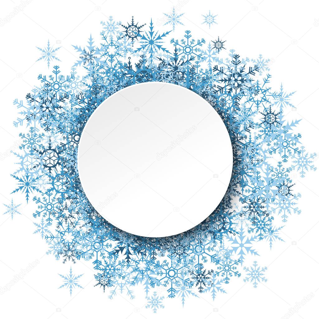 blue snowflakes behind empty round frame for christmas winter greetings on white background