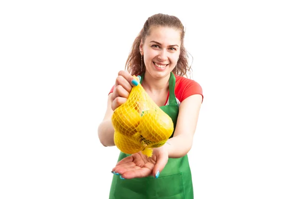 Young Smiling Woman Supermarket Retail Worker Offering Bag Lemons Fresh — Stock Photo, Image