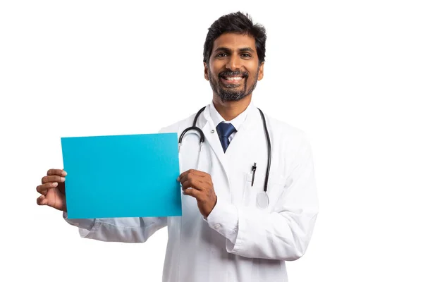 Cheerful Indian Doctor Man Smiling Showing Blank Advertising Copyspace Blue Stock Image