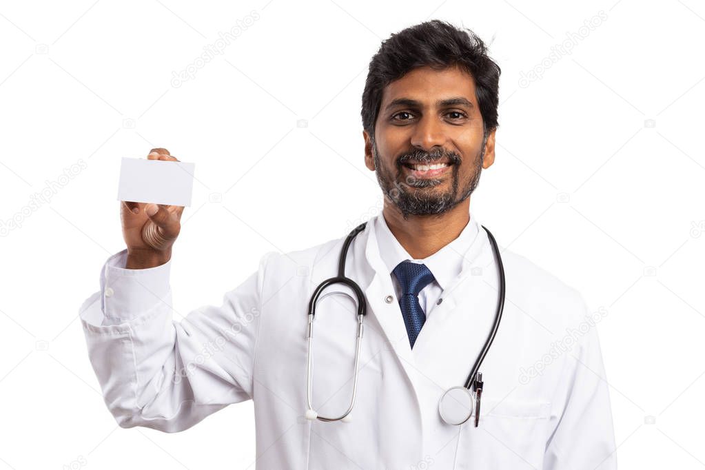 Trustworthy indian male doctor holding blank text area on card as contact concept isolated on white background