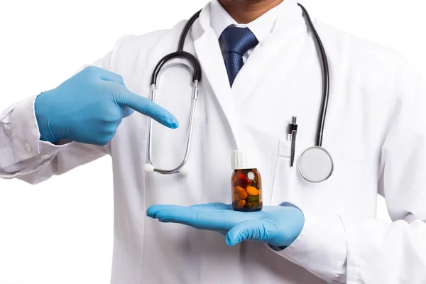 Indian Medic Wearing Blue Gloves Pointing Pill Bottle Index Finger — Stock Photo, Image