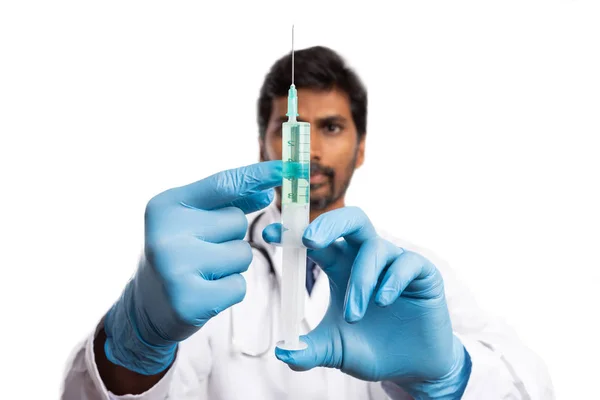 Indian Male Medic Checking Syringe Vaccine Close Isolated White Studio — Stockfoto