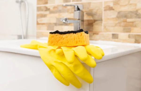 Yellow Sanitary Rubber Gloves Orange Sponge Edge White Porcelain Sink — Stock Photo, Image