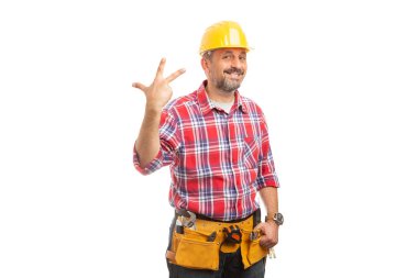 Beyaz stüdyo arka plan üzerinde izole kavramı sayma olarak üç parmak dayanabiliyor gülümseyen Oluşturucu