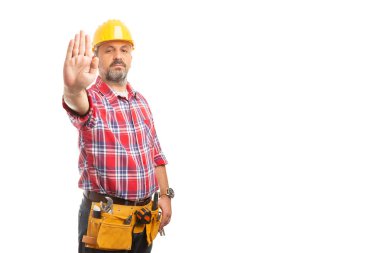 Palm ile ciddi ifade beyaz stüdyo arka plan üzerinde izole jest çapraz değil gibi gösterilen Oluşturucu