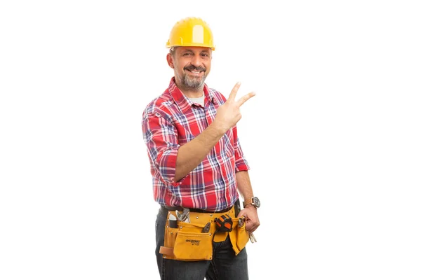 Construtor Mostrando Número Dois Sinal Com Dedos Isolados Fundo Estúdio Imagem De Stock