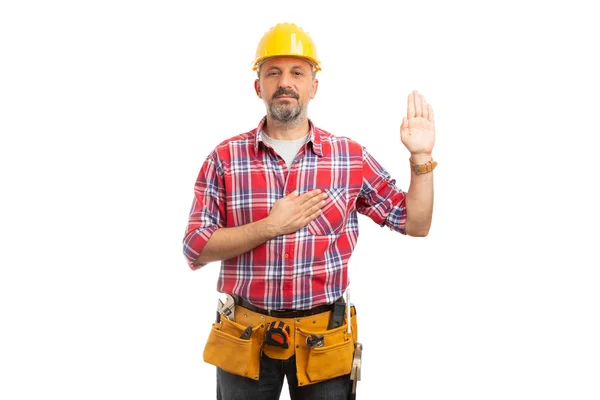 Serious Builder Swearing One Palm Other Hand Heart Isolated White — Stock Photo, Image